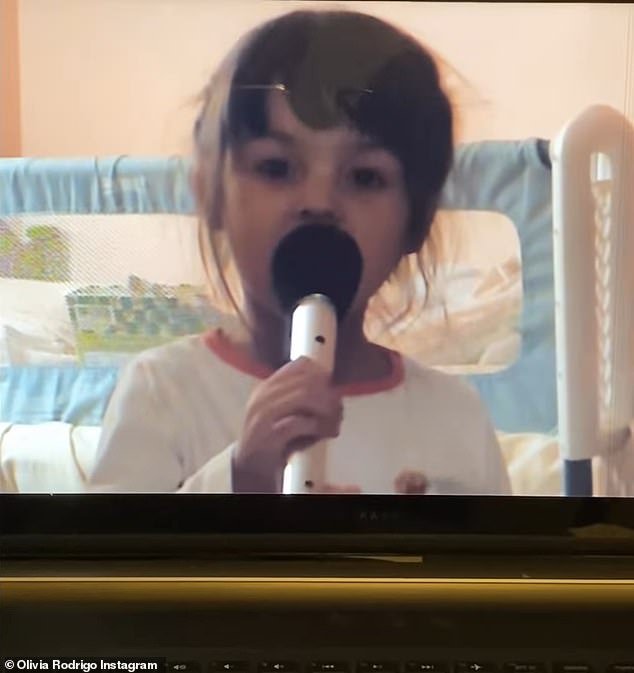 Cute: The clip seemingly showed the even younger Olivia blasting a song in her bedroom