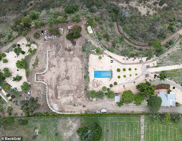 The plot is seen from above, with the guard house and swimming pool already in it