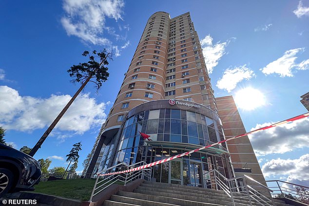 Police tape blocks an accident scene outside a multistory residential building after an alleged Ukrainian drone strike in Moscow, Russia, September 7, 2023