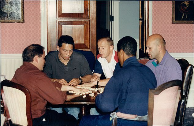 Brain confidence: The English class of 1991 (from left - Brian Moore, Rory Underwood, Richard Hill, Jeremy Guscott and Nigel Redman) wind down playing Scrabble