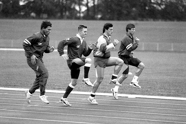 Underwood, Nigel Heslop, Carling and Rob Andrews raise their knees during practice