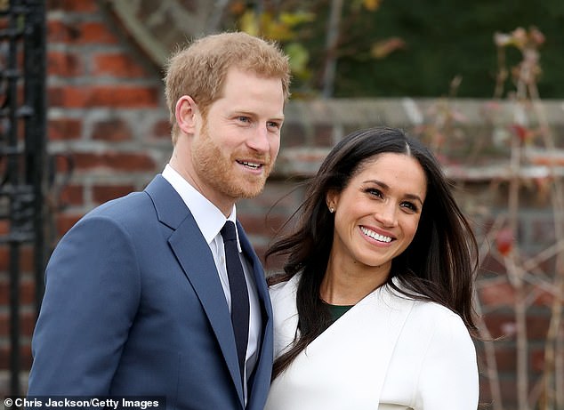 Prince Harry and Meghan during an official photocall to announce their engagement at Kensington Palace on Nov. 27, 2017