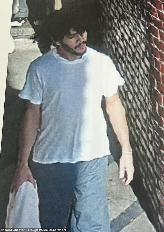 Police on Thursday released this photo of Cavalcante walking down a road in Pocopson Township, about three miles from the prison.