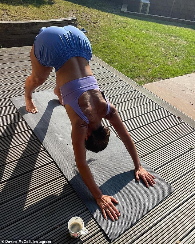 Impressive: She showed off her flexibility and balance as she twisted her body in various yoga poses on a mat