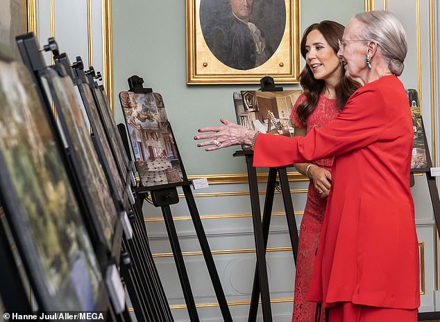 The Crown Princess was presented with a huge bouquet of flowers upon arrival at the event, before being seen studying a number of works of art alongside the Queen