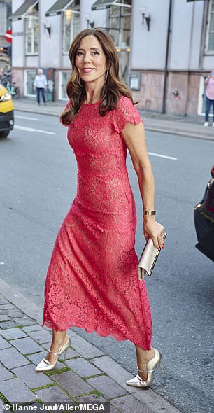 The royal looked elegant for the occasion in a vibrant scarlet dress, which she paired with trendy silver accessories