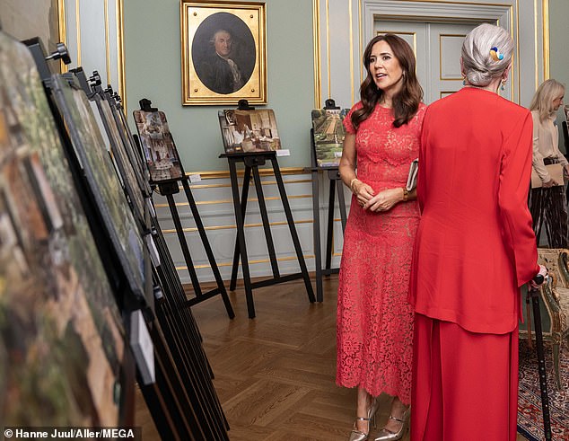 The two royal women matched perfectly in their scarlet ensembles at last night's event in Denmark