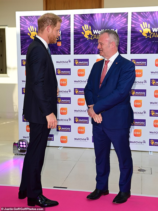 Prince Harry arrives on the red carpet ahead of the party night