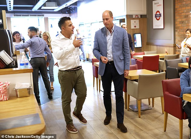 Prince William speaks this afternoon with Pret CEO Pano Christou in Bournemouth, 100 miles from the ceremony