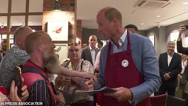 After making drinks, walking out and meeting members of the public, the future king was presented with a copy of the Big Issue