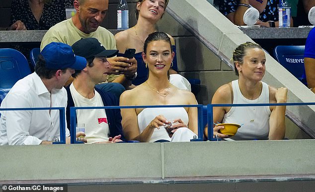 Group reunion: The Kushners were joined at the US Open by a bevy of friends sitting next to and behind them in the VIP box