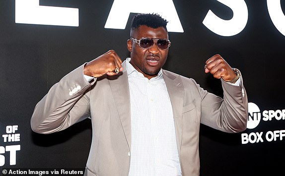 Boxing - Tyson Fury & Francis Ngannou press conference - HERE in Outernet, London, UK - September 7, 2023 Francis Ngannou poses as he arrives for the press conference Action Images via Reuters/Andrew Boyers