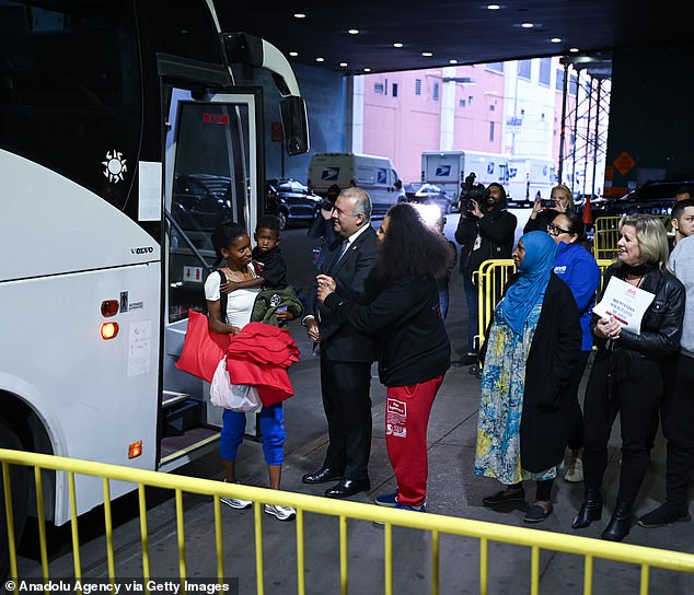 A bus of Texas migrants arrives at New York's Port Authority bus station on May 3
