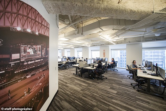 The results of the study showed how companies are increasingly looking for ways to get employees back to the office – and some of the surveillance methods used to enforce it.  Pictured: Employees work on the sports-themed 11th floor of the JPMorgan Chase office at 600 Travis, Tuesday, September 7, 2021 in Houston