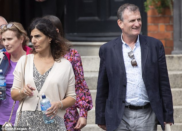 Anna (second left) and Gary Crowe, parents of the late Julie Crowe, photographed leaving Dublin District Coroner's Court this afternoon after giving evidence at the inquest into the death of an 18-year-old