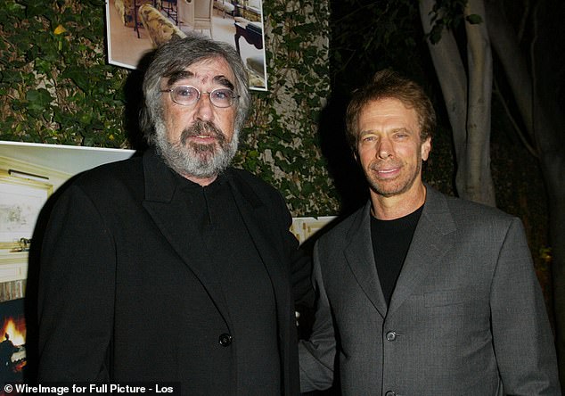 Bond: He is pictured with Jerry Bruckheimer in West Hollywood in November 2004