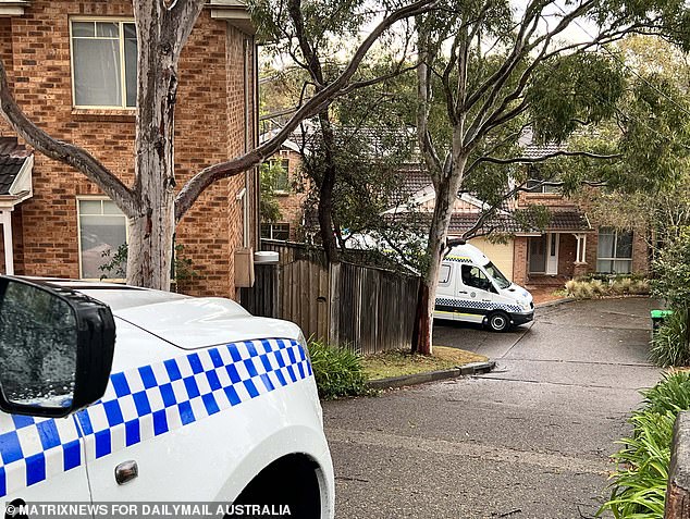 Two police vehicles were parked outside the home in Berowra Heights on Friday