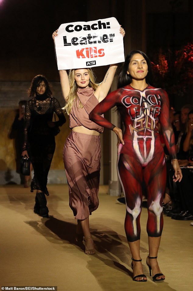 1694151583 768 Skinned PETA supporter crashes the Coach runway show during NYFW