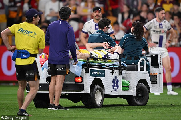 The Storm's Ryan Papenhuyzen is taken off the field on a stretcher after an ankle injury during the NRL qualifying final between the Brisbane Broncos and Melbourne Storm