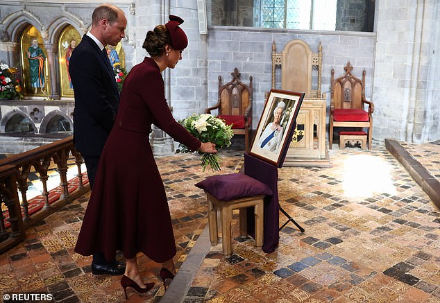 The Princess of Wales lays flowers during today's service at St. David's Cathedral in Wales