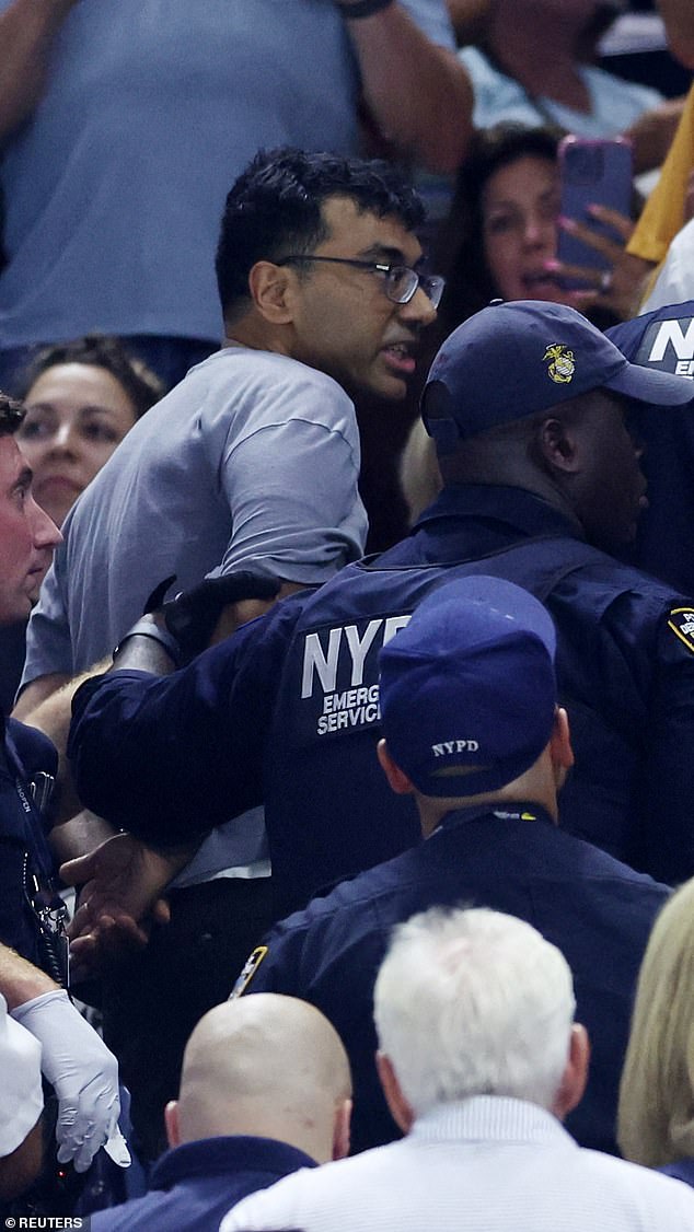 The protester glued his feet to the concrete at Arthur Ashe Stadium late Thursday evening