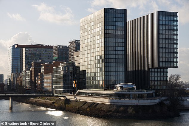 Harry and Meghan are staying at the Hyatt Regency hotel in Dusseldorf, which consists of two towers, seen here at the front of the image