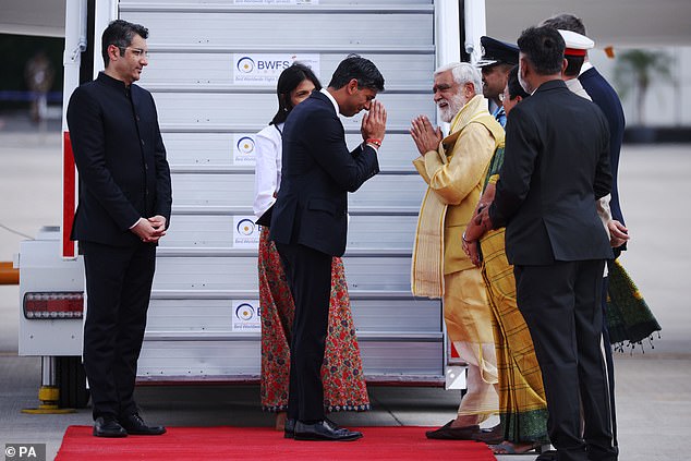 The Prime Minister was greeted by India's Foreign Minister after landing in the country