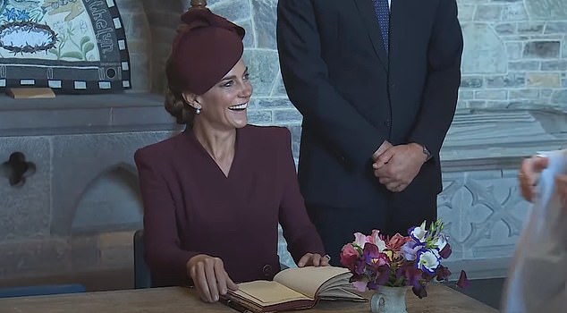 They later signed the visitors book, with expert lip reader Jacqui Press revealing the words the couple exchanged in the process.