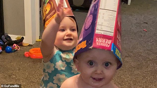 The twins settled into the box where their cuddly toys were kept on August 25.  They ran out of oxygen, suffocated and were eventually found dead.