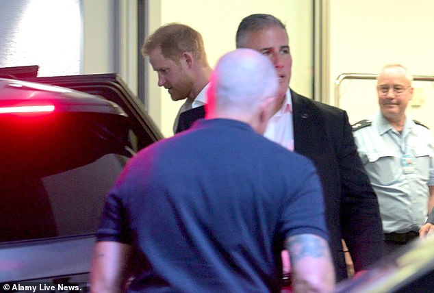 Hours later, photographers captured him arriving in Germany for the Invictus Games, which take place this weekend, leaving Britain without seeing his father or brother.