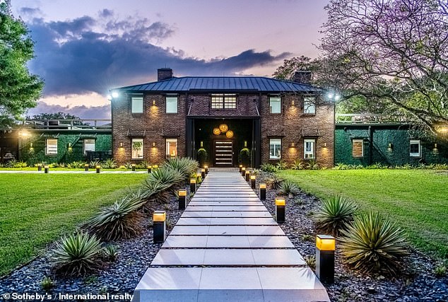 Wow: The stunning nine-bedroom property, which spans 5,183 square feet, comes with a soccer field and riding stables, according to TMZ