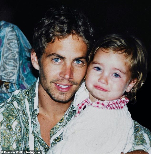 Father-daughter: Cody spoke about his relationship with Paul's daughter Meadow, pictured here with her father, after reports that they are now estranged