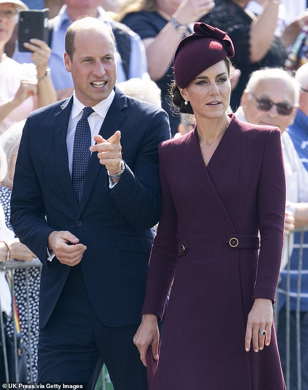 The princess was elegant in a burgundy coat by Eponine and hat by Sahar Millinery