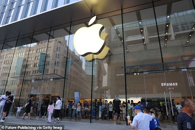 Visitors pass the renovated flagship Apple Store in Shanghai.  Last week marked the 30th anniversary of Apple entering China, which has become the largest market for the iPhone