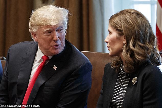 South Dakota Governor Kristi Noem is expected to endorse former President Donald Trump at a campaign rally on Friday, potentially widening Trump's lead.  Above, pictured in December '18