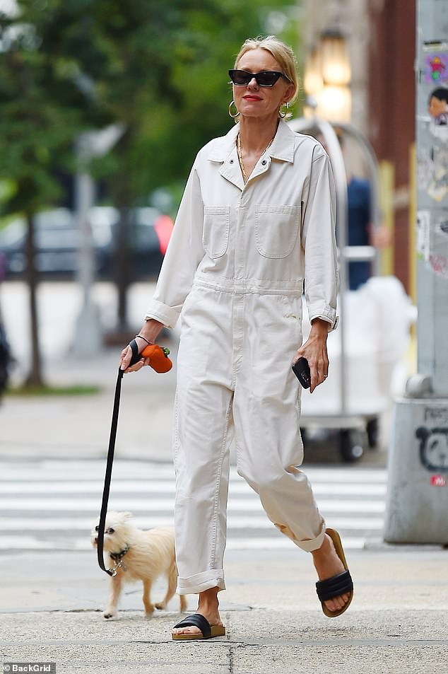 The 54-year-old was spotted in a cool white denim jumpsuit while walking her dog in Tribeca