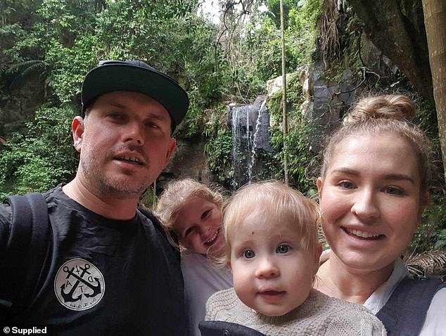 Lola (pictured, centre) was discharged by doctors just three hours after being taken to Beaudesert Hospital on August 5, but was found unconscious in her bed the next morning by her father Matthew (pictured left)