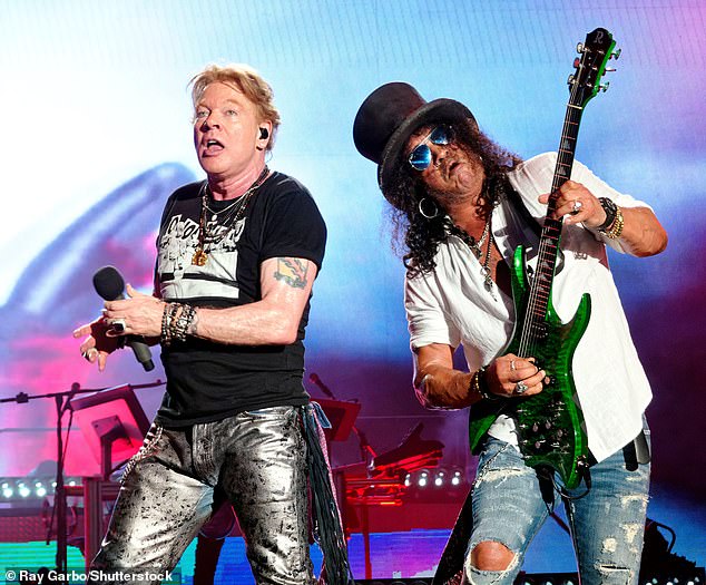 A checkered past: GNR, and specifically Axl Rose (left), have had a somewhat contentious relationship with St. Louis since the so-called Riverport Riot, when fans tore apart the Riverport Amphitheater (now called Hollywood Casino Amphitheater) on July 2, 1991.  after the singer canceled the show when he saw a photographer taking photos, despite photos being banned