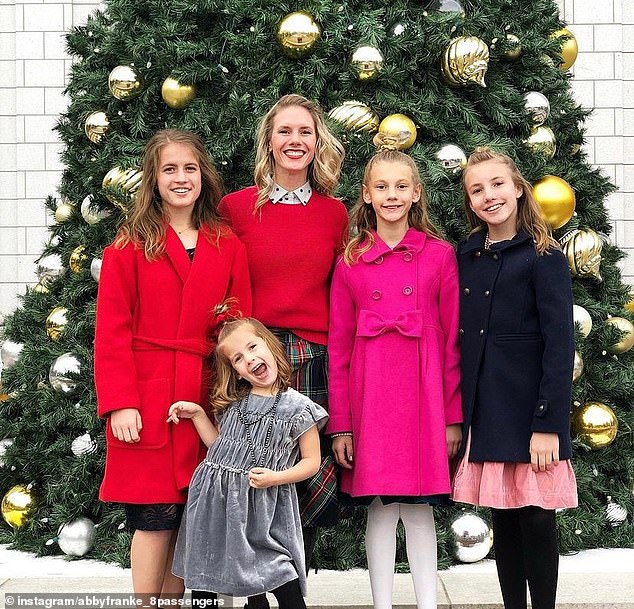 Ruby Franke is seen with her four daughters: Shari (red coat), Eve (gray dress), Julie (pink coat) and Abby (black coat)