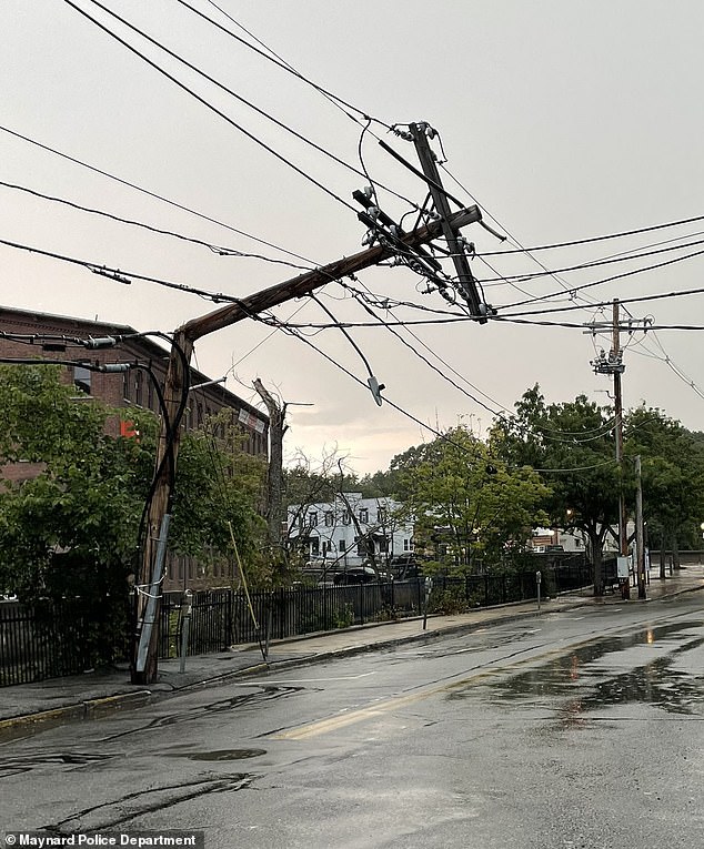 Crews worked through Friday to clear roads after the storm surge ripped through, also downing power lines