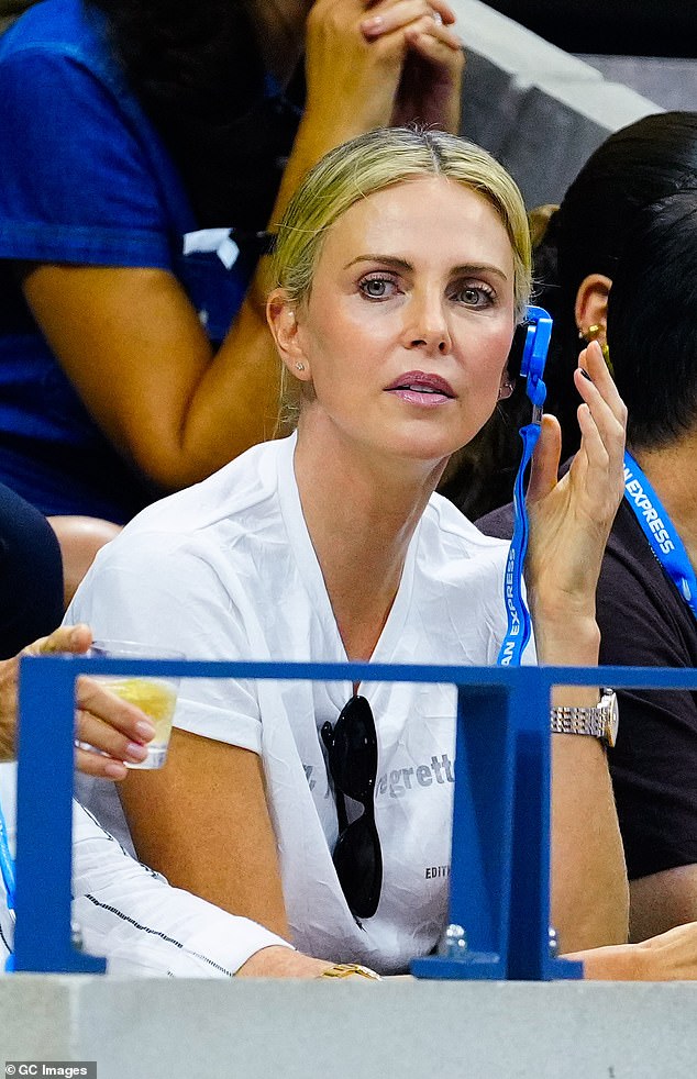 Theron left her two young daughters Jackson, 11, and August, seven, at home, apparently with a nanny, to attend the US Open