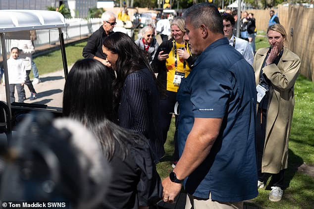 The Duchess of Sussex, wearing a pinstripe jacket, was overshadowed by Mr Sanchez last year