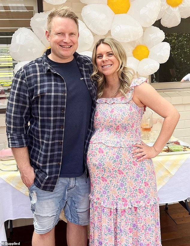 Keely's ordeal began in late 2022 when she was seven months pregnant and felt a small lump on her breast the size of a pea and only had it examined after giving birth (pictured with husband Josh, 38)