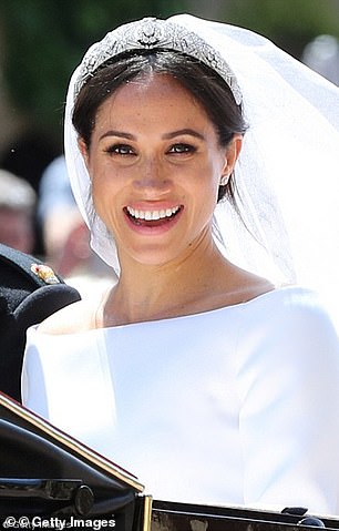 Meghan was seen riding in a carriage after marrying Prince Harry