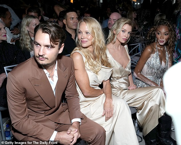 Front row: Maye Musk, Brooke Wall, Brandon Thomas Lee, Pamela Anderson and Stella Maxwell also attended the lavish event, joining Winnie in the front row