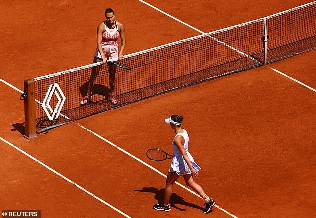 The conflict between Russia and Ukraine has caused a lot of controversy in tennis, with stars from both countries often booed if they do not shake hands with the opponent (photo: Belarusian Aryna Sabalenka (above) waits at the net after beating the Ukrainian Elina Svitolina)