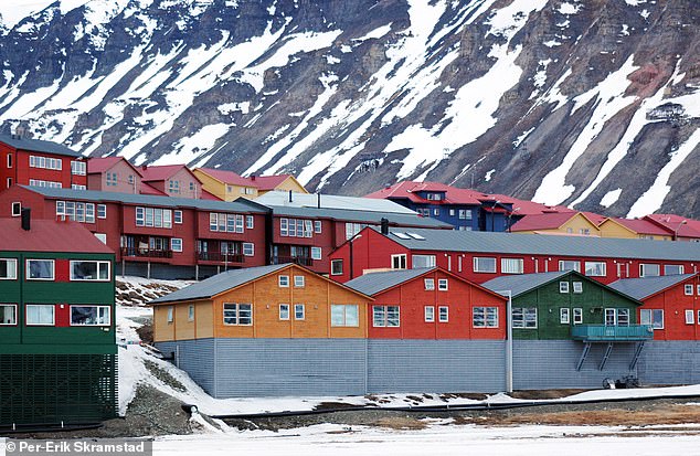 I took a plane from Oslo to the small Norwegian town of Longyearbyen (photo)