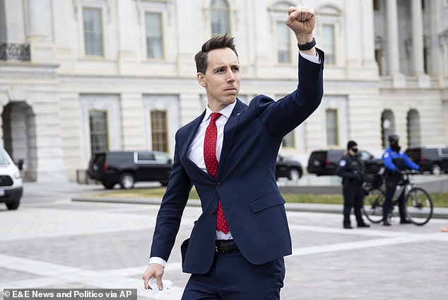 Sen. Josh Hawley (R-Mo.) gestures to a crowd of President Donald Trump's supporters gathered outside the U.S. Capitol to protest the certification of President-elect Joe Biden's Electoral College victory.  He and other lawmakers who have objected to electoral votes could be called as witnesses