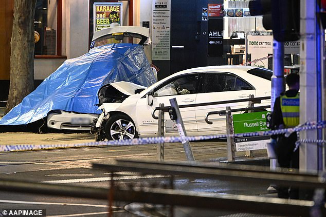 Victoria Police allege Khan accelerated the car after allegedly mowing down three pedestrians at a tram stop on the corner of Bourke Street and Swanston Street.