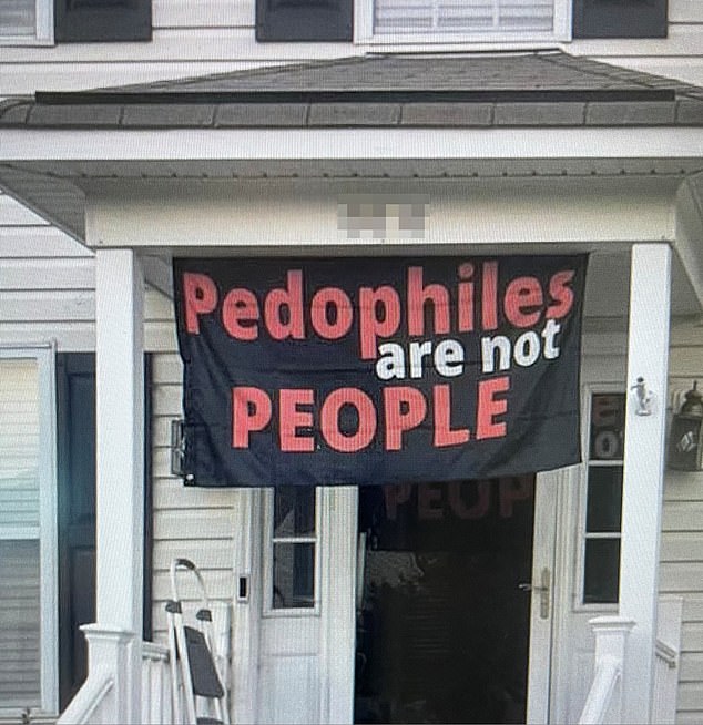 When the twins' outraged parents learned of the alleged abuse, they expressed their anger by hanging a huge banner over their porch that read 